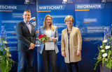 Prof. Bertil Haack, Technical University of Applied Sciences Wildau, Ulrike Vogt, student and winner of the PROMOS consult scholarship in 2019, and Prof. Ulrike Tippe, President of Wildau TUAS (from left to right) Stipendiumvergabe der PROMOS consult auf dem HIT 2019 der TH Wildau